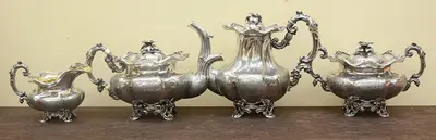 Серебряный чайно-кофейный сервиз из 4 предметов в стиле второго рококо